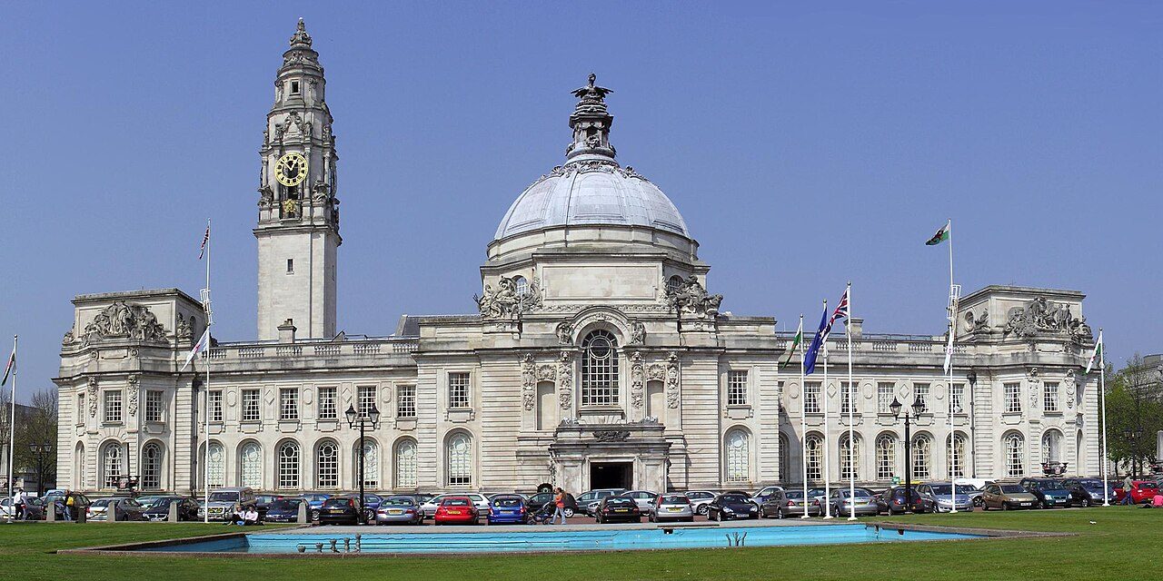 the Portland-stone dome and clock tower of Cardiff City Hall in Cathays Park