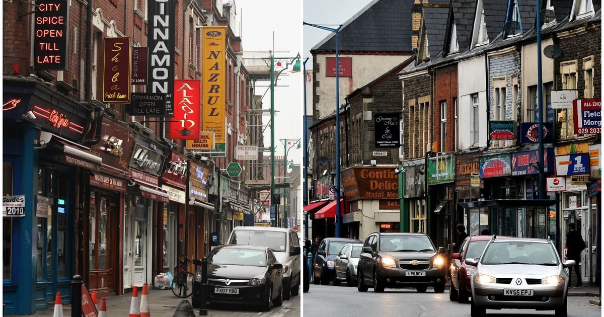 Shopfronts and evening traffic along City Road in Roath, Cardiff